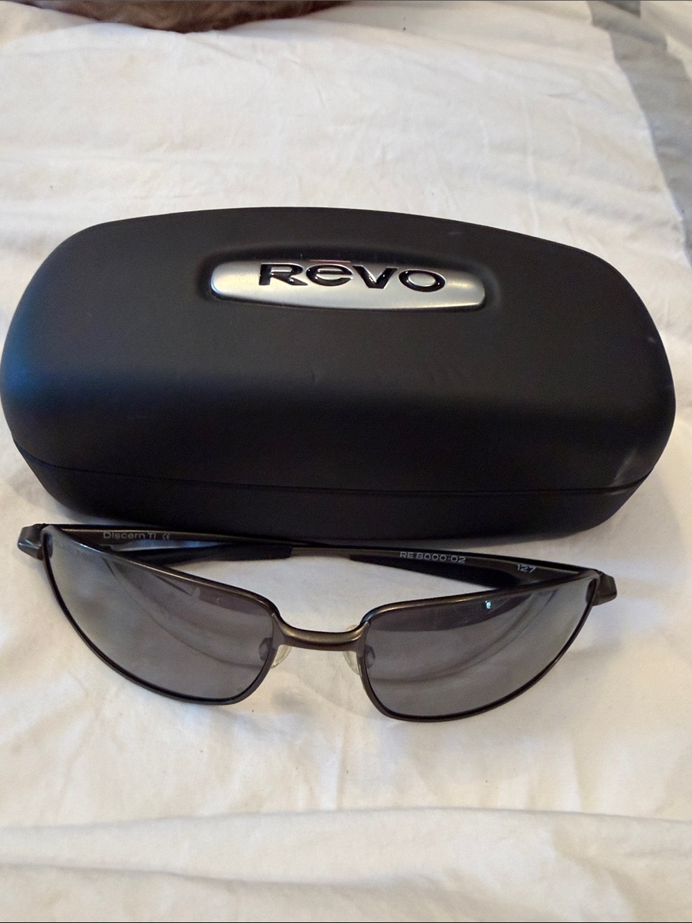 Revo Sunglasses in Black Frames with Gray Lenses and Branded Case. Discontinued